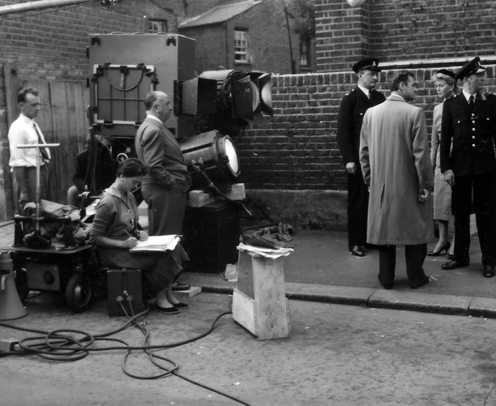 Connie Willis (seated, left) working as a continuity ‘girl’ on the set of The Man Who Knew Too Much (1956), co-starring Doris Day (standing, right). Photo courtesy of The Cinema Museum.